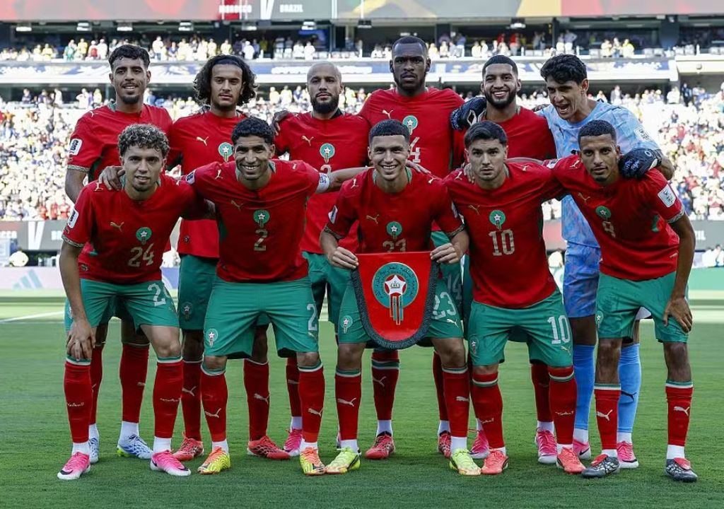 Jogadores da seleção de Marrocos durante partida da Copa do Mundo de 2026 que marcou recorde histórico no torneio.